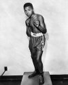 12-Year-Old Muhammad Ali Posing Prior To His Amateur Ring Debut In 1954.jpg