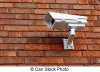 surveillance-camera-on-brick-wall-side-view.jpg